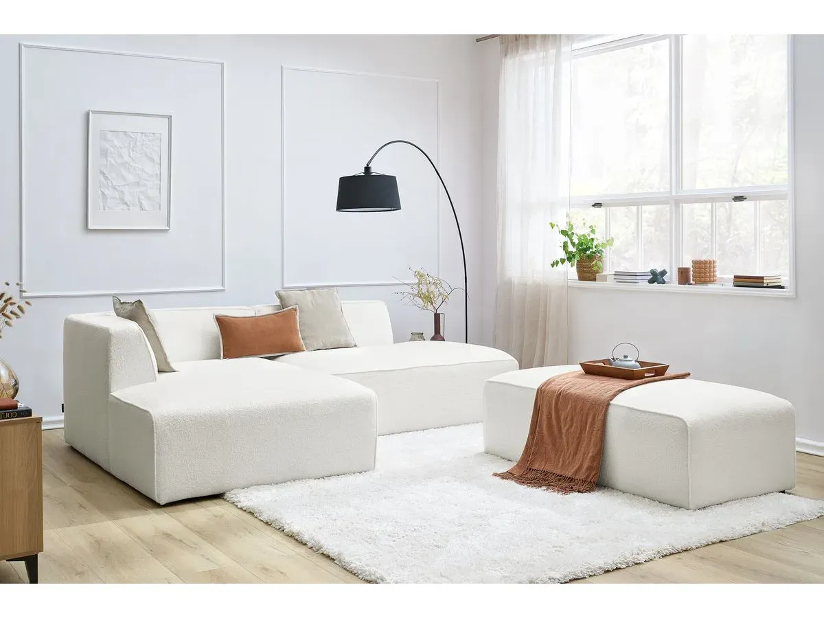 Canapé d'angle fixe modulable MEGEVE tissu bouclette avec pouf blanc  angle gauche BOBOCHIC 5 places