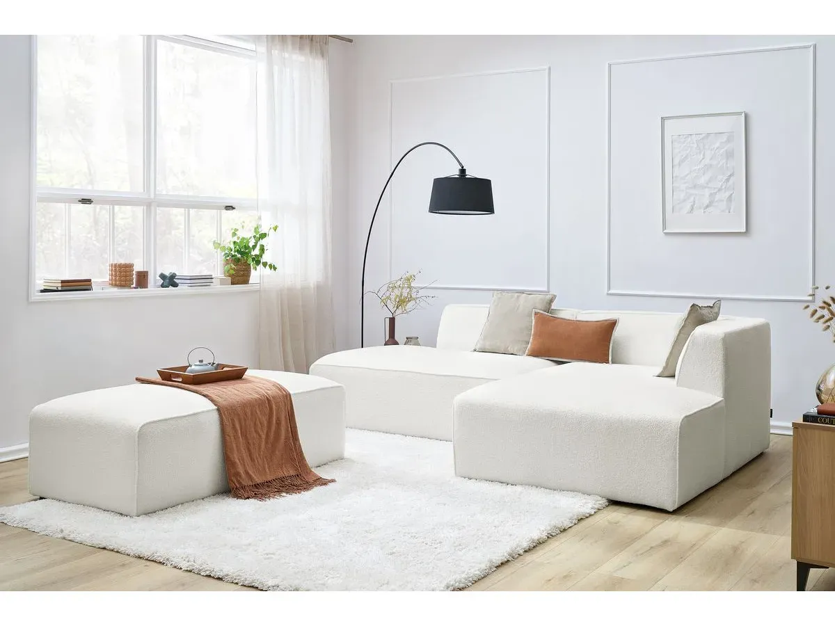 Canapé d'angle fixe modulable MEGEVE tissu bouclette avec pouf blanc  angle droit BOBOCHIC 5 places