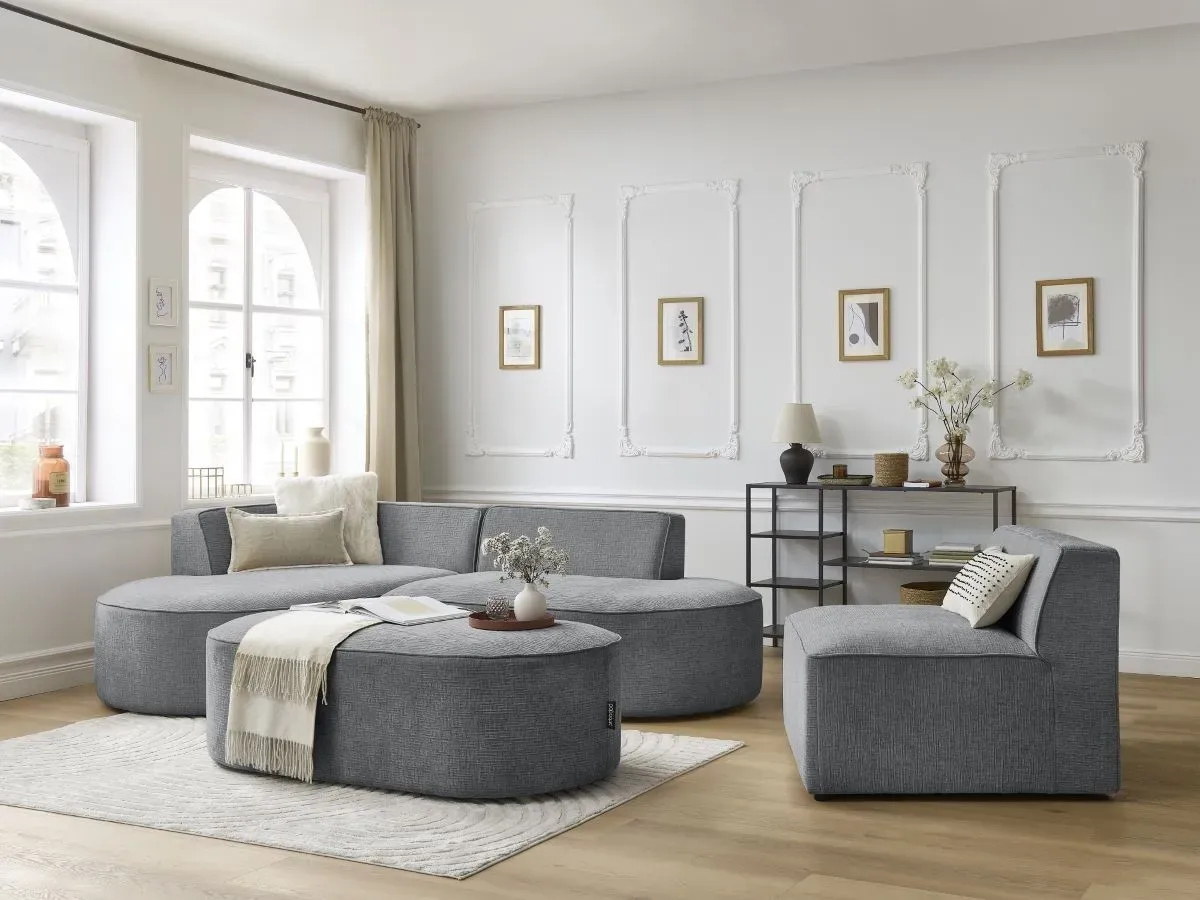 Canapé d'angle fixe modulable ROUSSEAU tissu texturé avec 1 chauffeuse et 1 pouf gris foncé  angle gauche BOBOCHIC 6 places