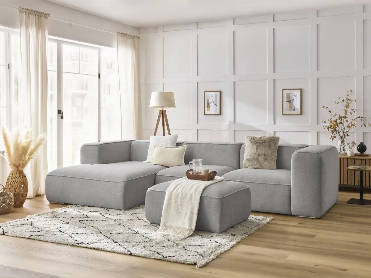 Canapé d'angle fixe ZEPHYR avec pouf gris clair  angle gauche BOBOCHIC 5 places