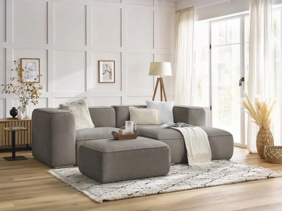 Canapé d'angle fixe compact ZEPHYR avec pouf taupe  angle droit BOBOCHIC 4 places