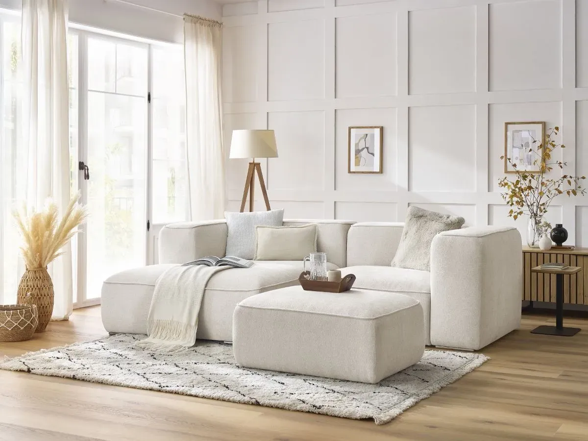 Canapé d'angle fixe compact ZEPHYR avec pouf blanc  angle gauche BOBOCHIC 4 places