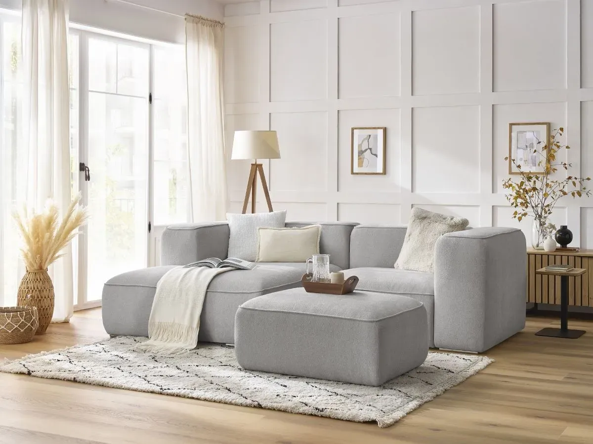 Canapé d'angle fixe compact ZEPHYR avec pouf gris clair  angle gauche BOBOCHIC 4 places