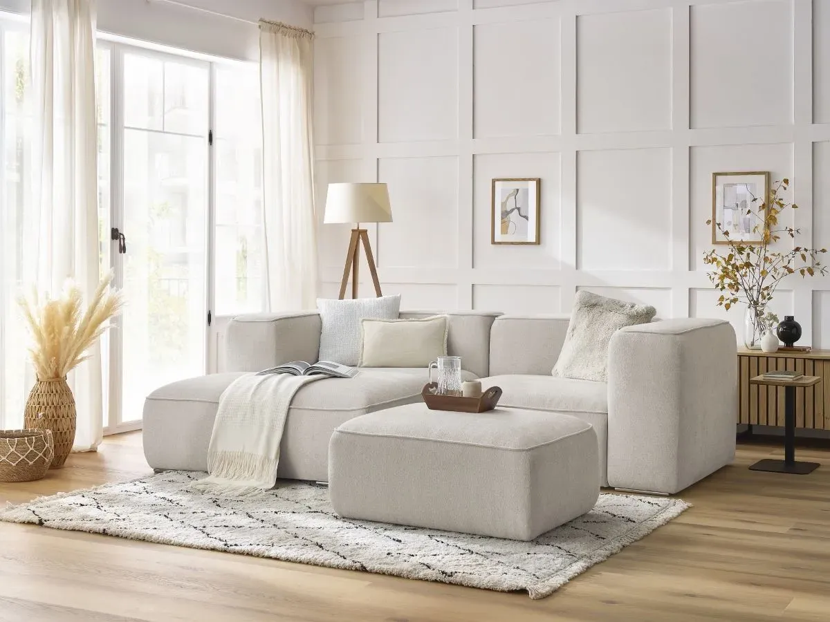 Canapé d'angle fixe compact ZEPHYR avec pouf beige  angle gauche BOBOCHIC 4 places