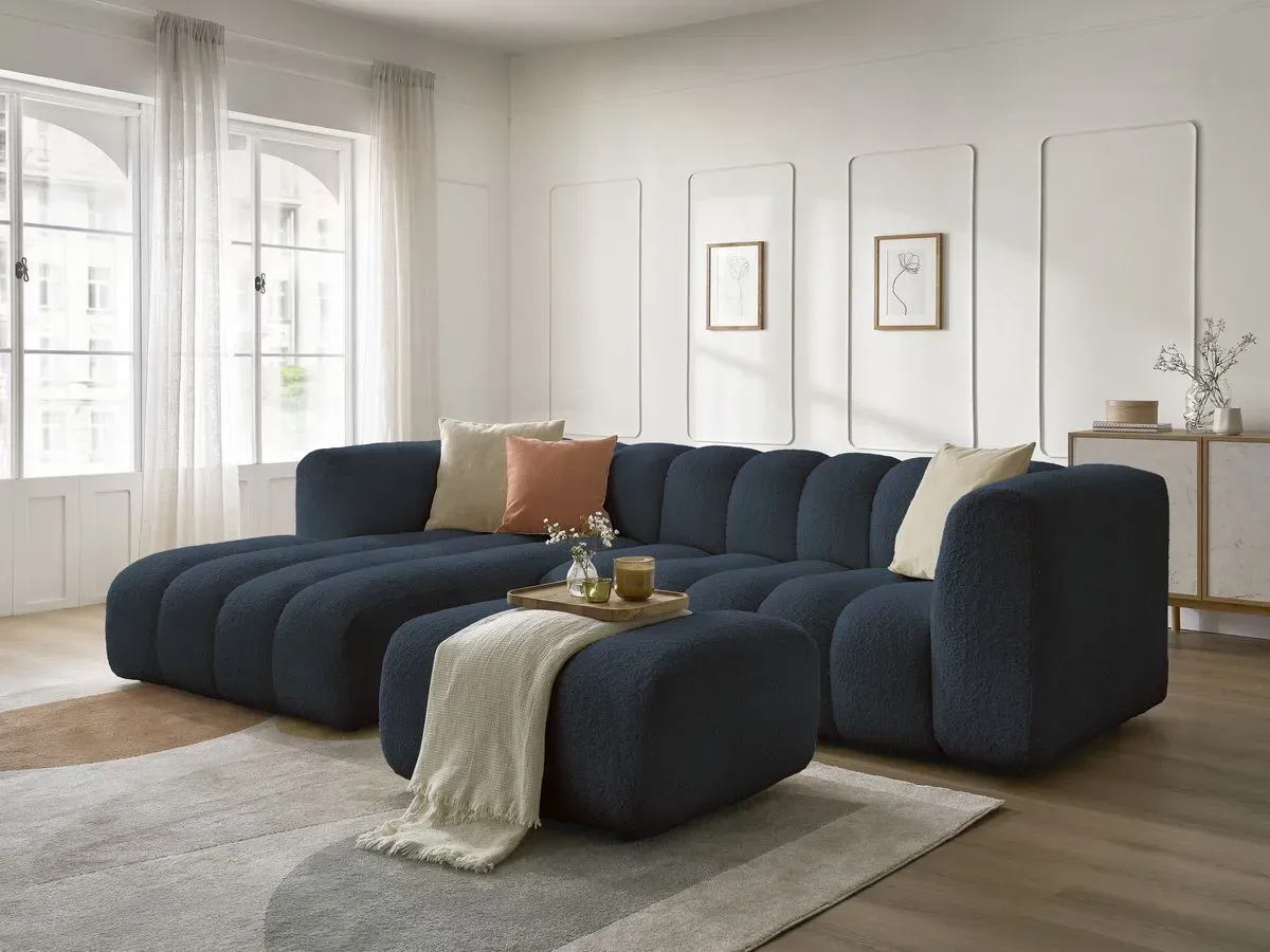 Canapé d'angle fixe TALIA tissu bouclette avec pouf bleu foncé  angle gauche BOBOCHIC 4 places