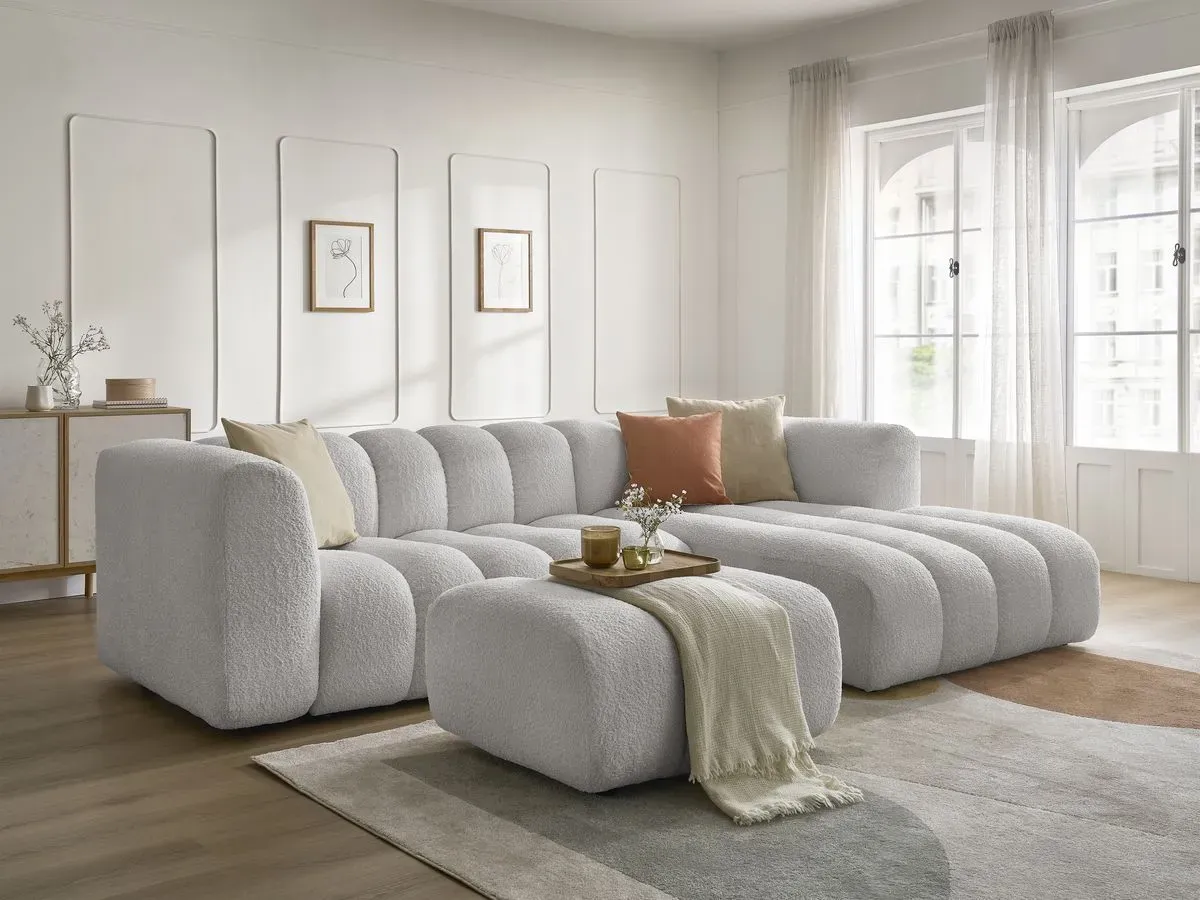 Canapé d'angle fixe TALIA tissu bouclette avec pouf gris clair  angle droit BOBOCHIC 4 places