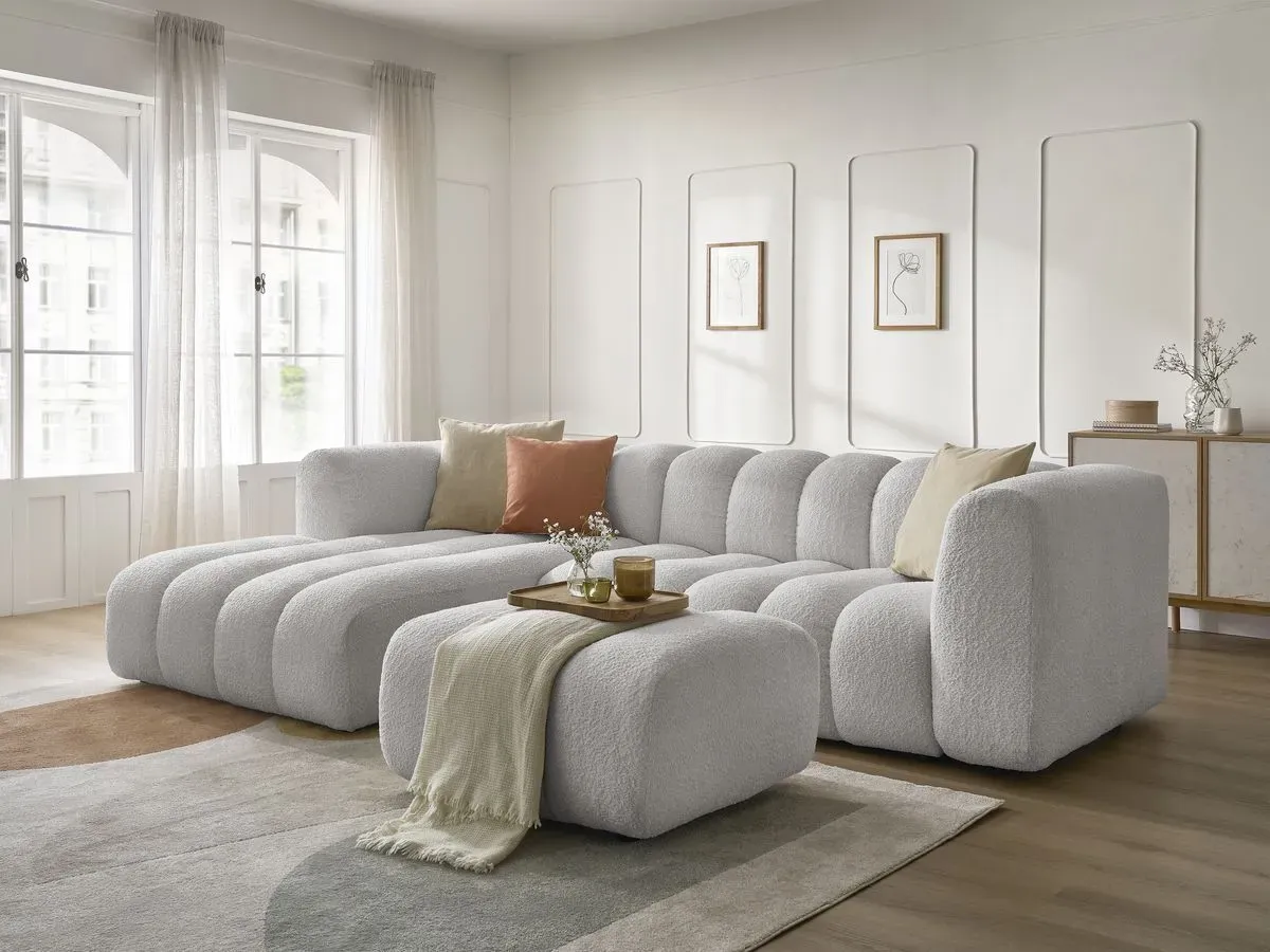 Canapé d'angle fixe TALIA tissu bouclette avec pouf gris clair  angle gauche BOBOCHIC 4 places