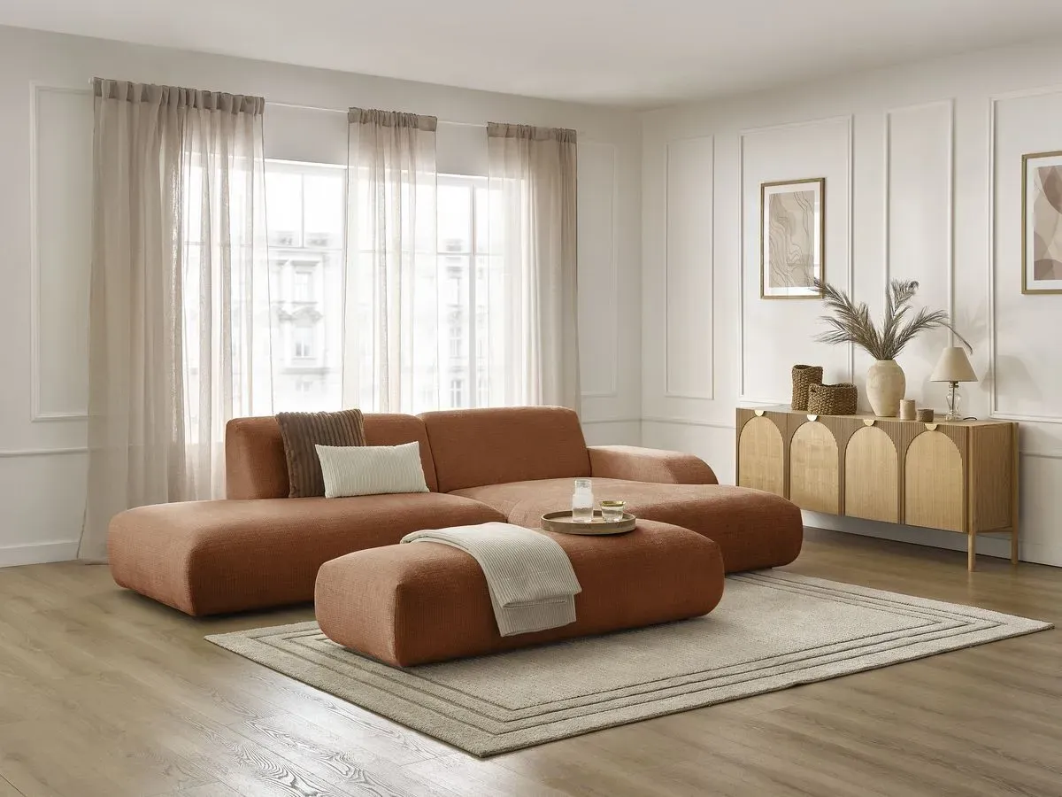 Canapé d'angle fixe SIRIUS tissu texturé avec grand pouf orange  angle droit BOBOCHIC 4 places