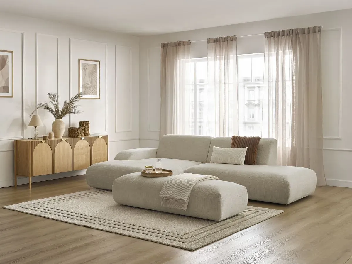Canapé d'angle fixe SIRIUS tissu texturé avec grand pouf beige  angle gauche BOBOCHIC 4 places