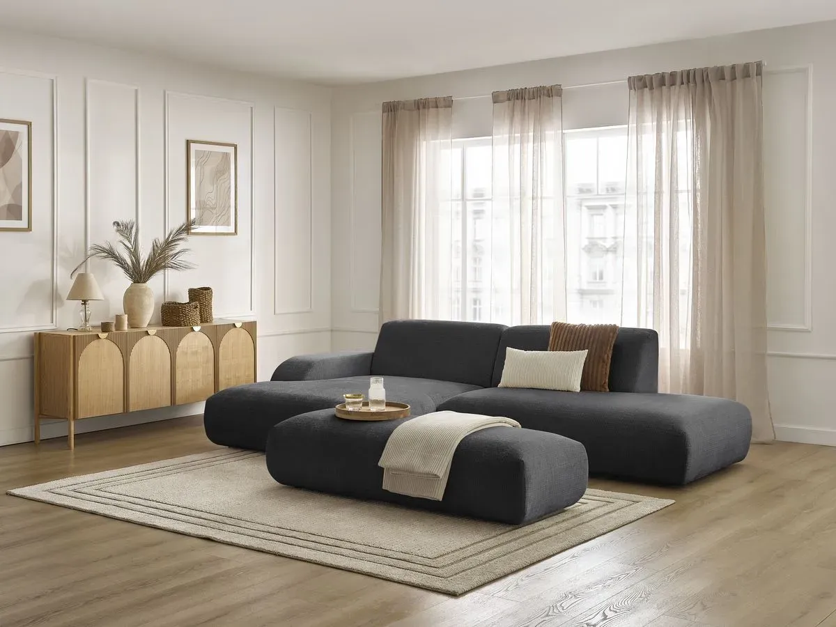 Canapé d'angle fixe SIRIUS tissu texturé avec grand pouf noir  angle gauche BOBOCHIC 4 places