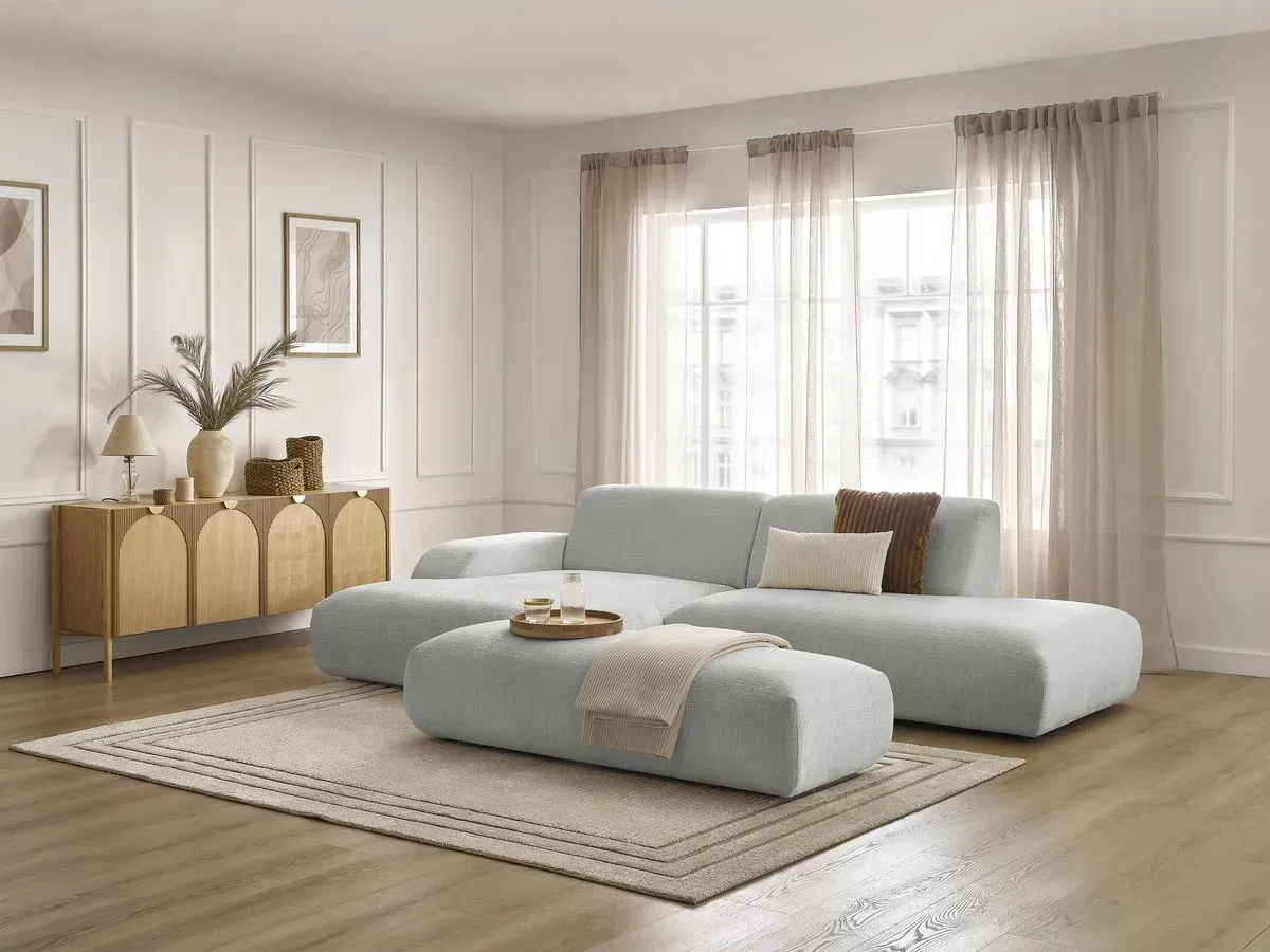 Canapé d'angle fixe SIRIUS tissu texturé avec grand pouf gris clair  angle gauche BOBOCHIC 4 places