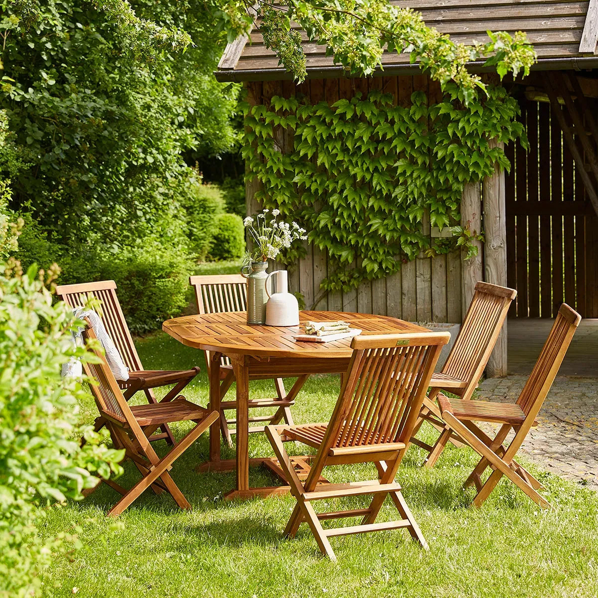 Salon de jardin en teck huilé massif extensible 6/8 places