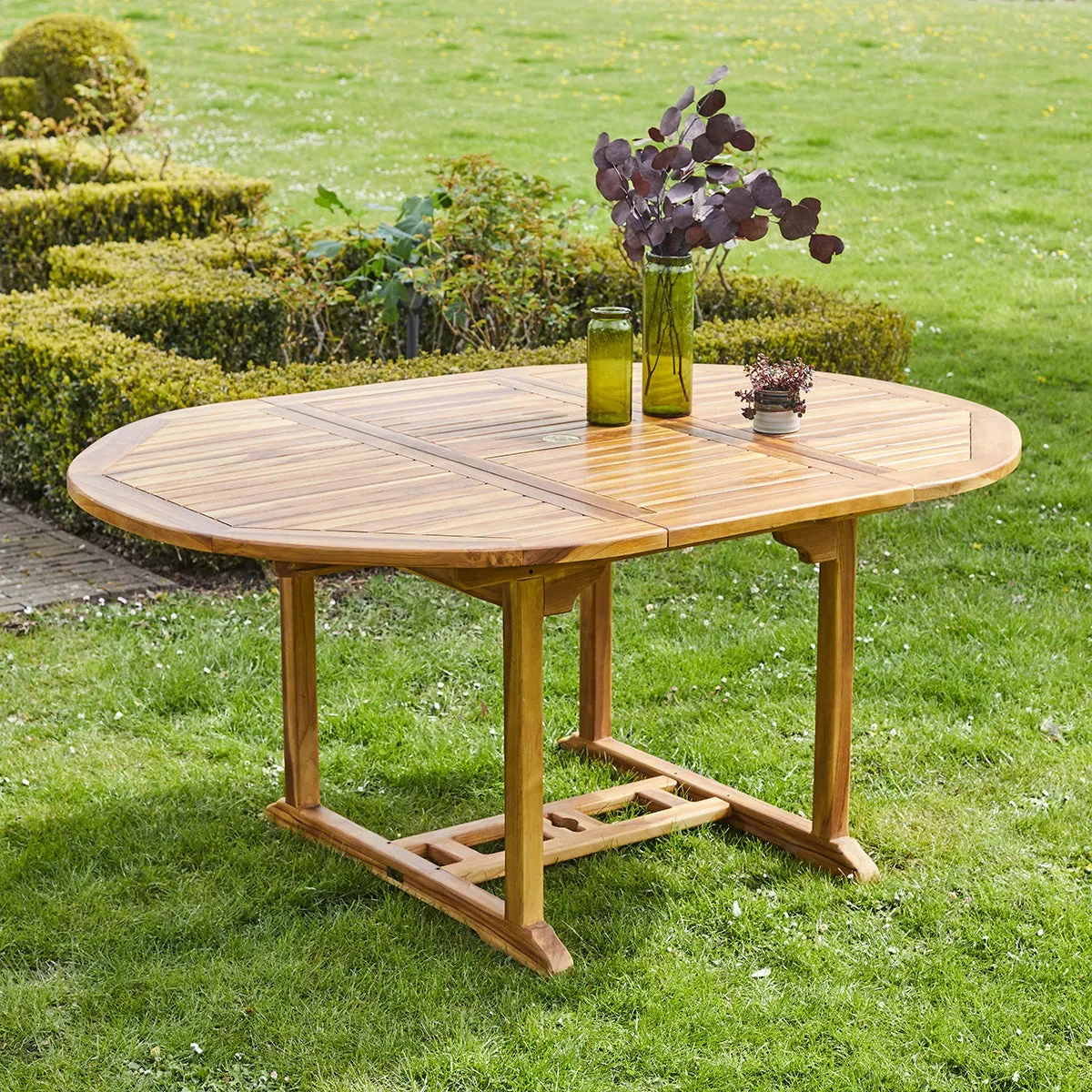 Table de jardin en teck huilé massif extensible ovale 6/8 places