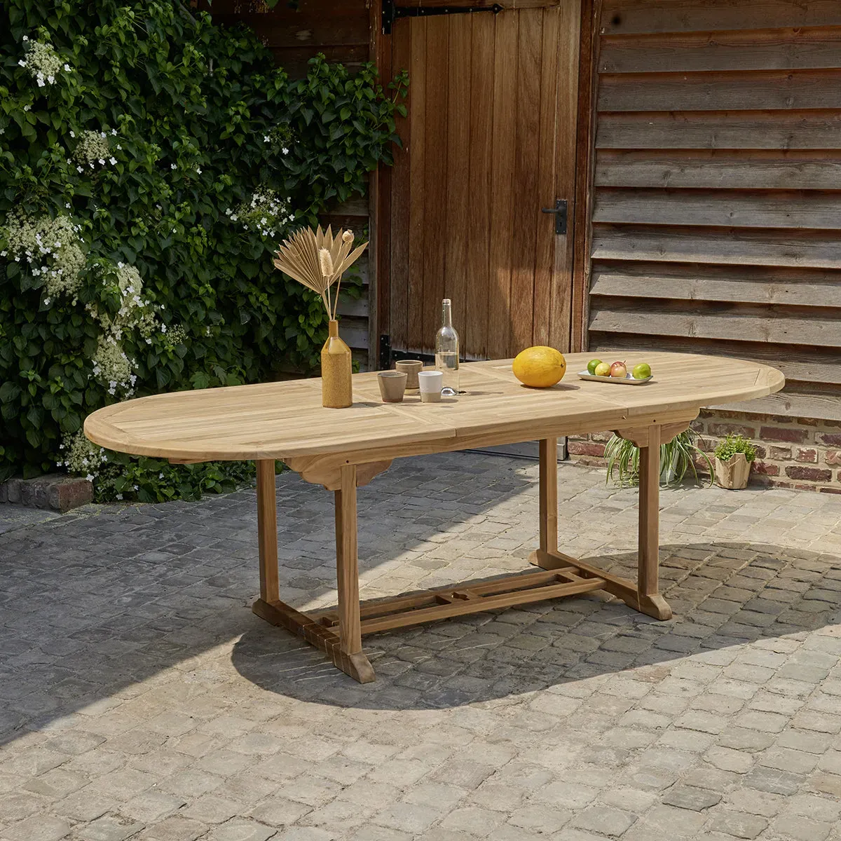 Table de jardin en teck massif extensible ovale 8/10 places