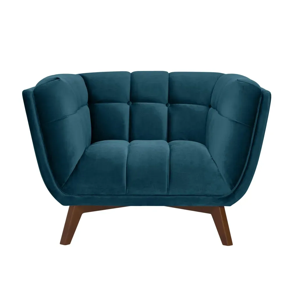 Fauteuil en velours bleu foncé