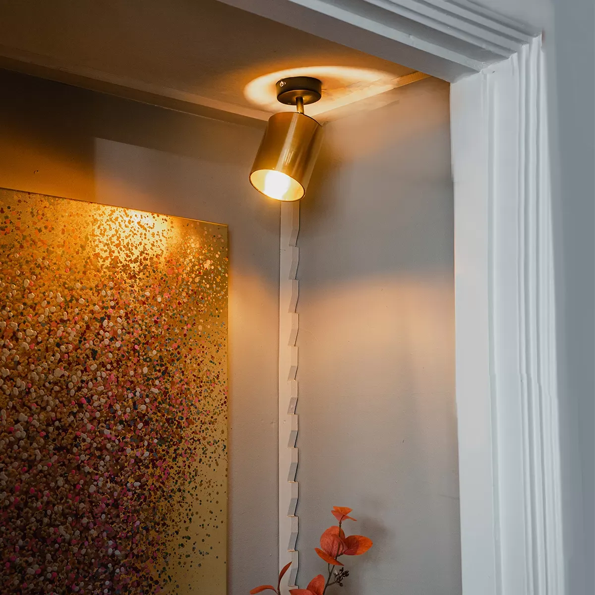 Spot murale en plastique doré/laiton