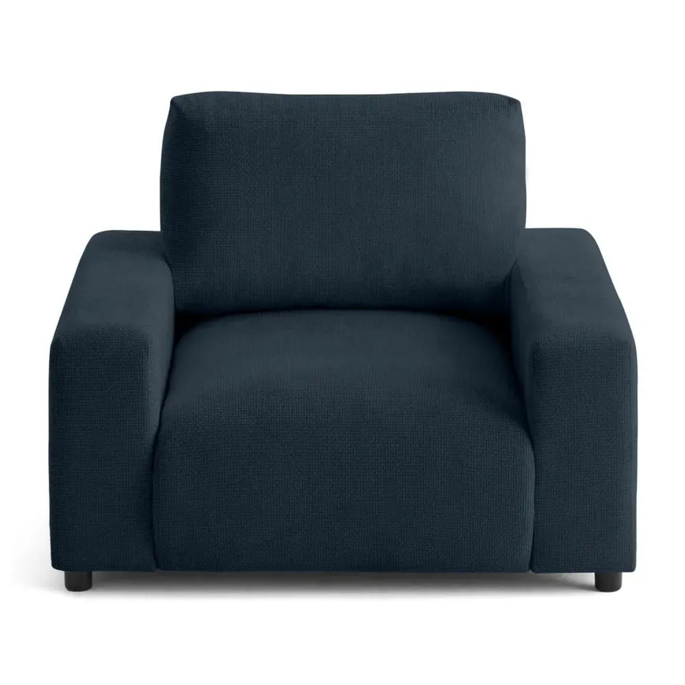 Fauteuil en velours texturé bleu