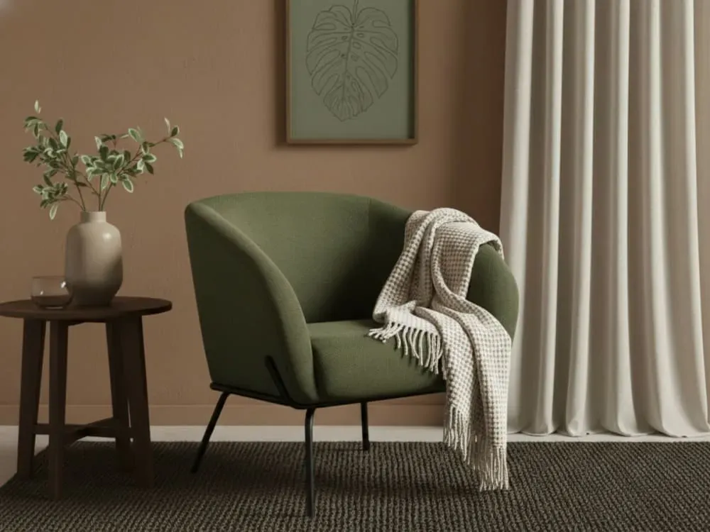 Fauteuil en tissu vert et pieds en métal noir style contemporain