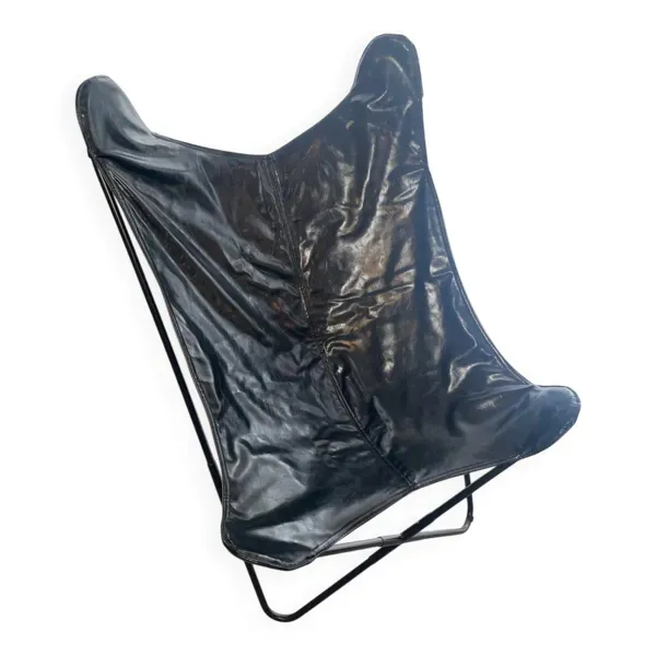 Fauteuil papillon en similicuir en parfait état