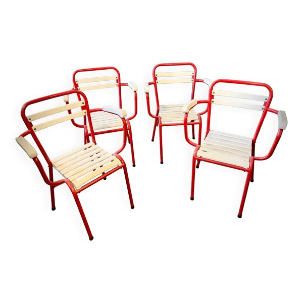 Quatre chaises TOLIX avec accoudoirs