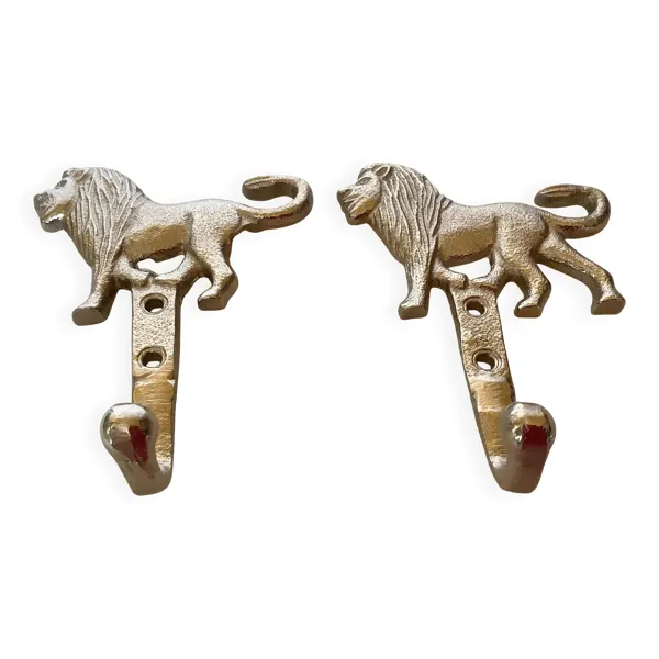Paire de patères lions argentées