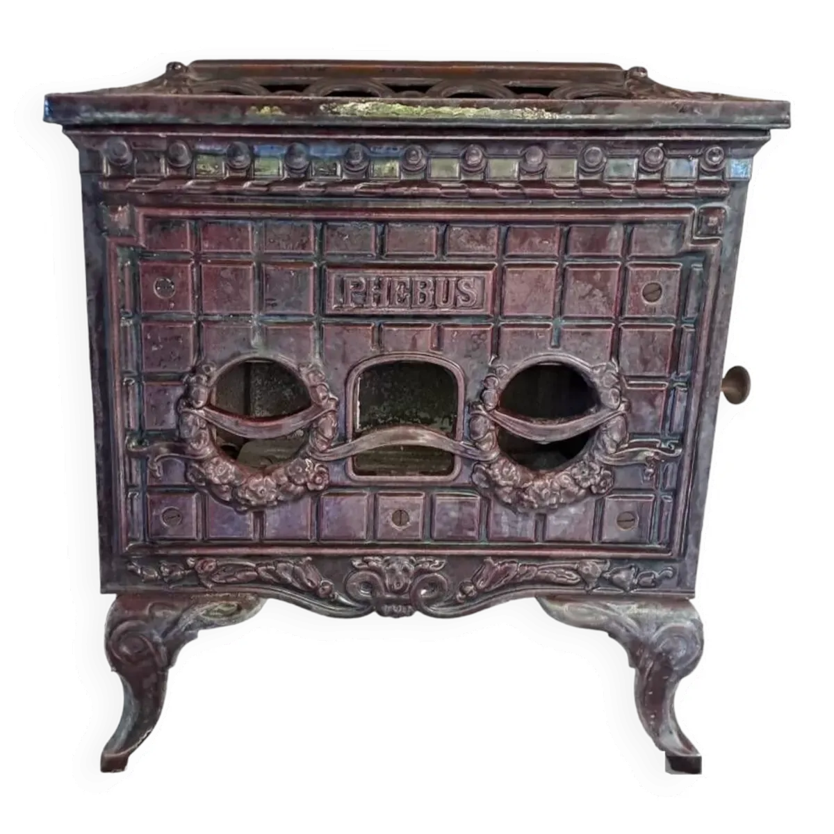 Poêle à bois ancien en fonte émaillée art deco marque phebus coloris aubergine
