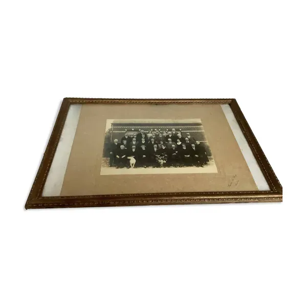 Ancienne photographie de mariés avec un chien