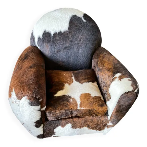 Fauteuils club en peau de vache