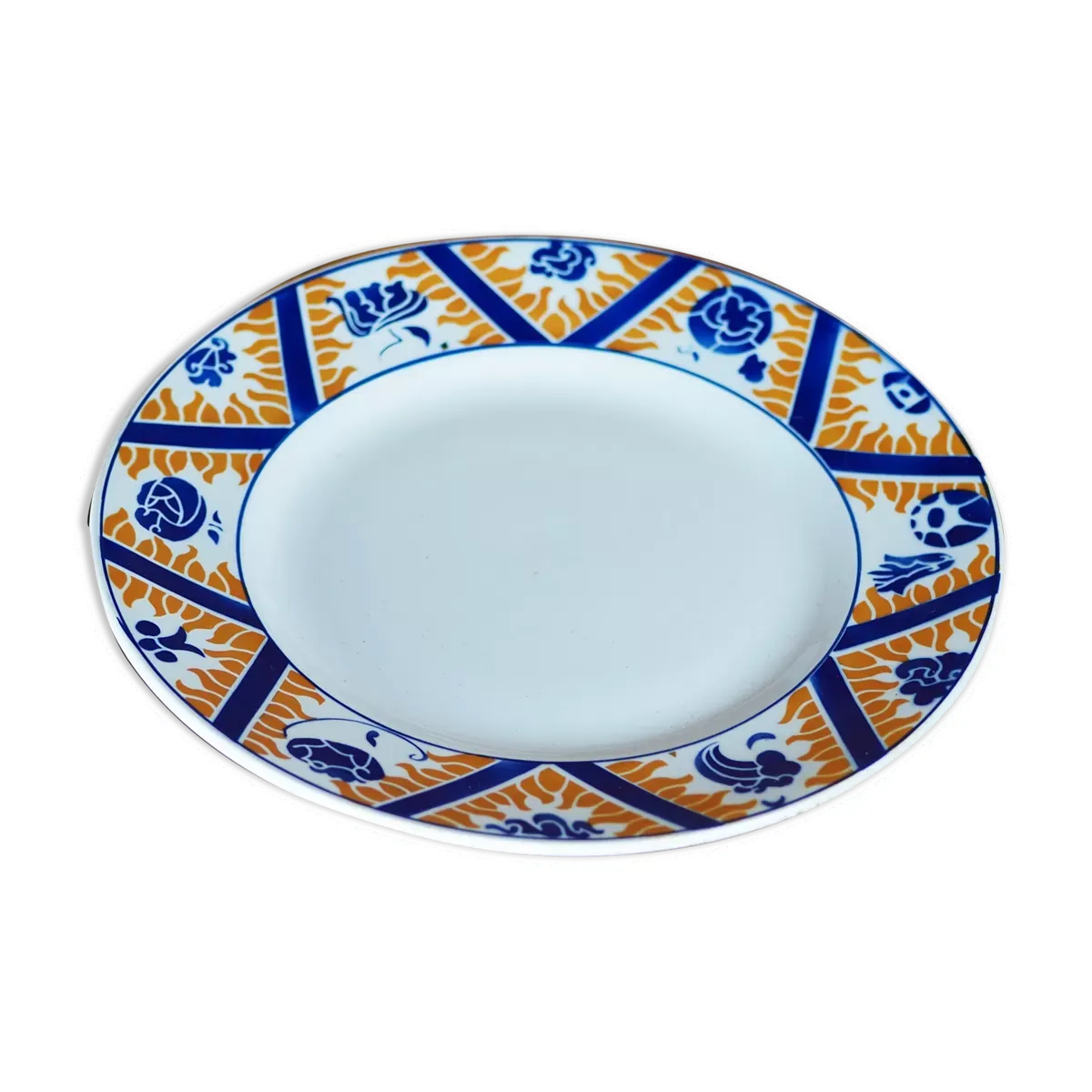 Plat à gâteau en faïence à motif de fleurs, nuages et flammes, orange et bleu - Orchies - 50s