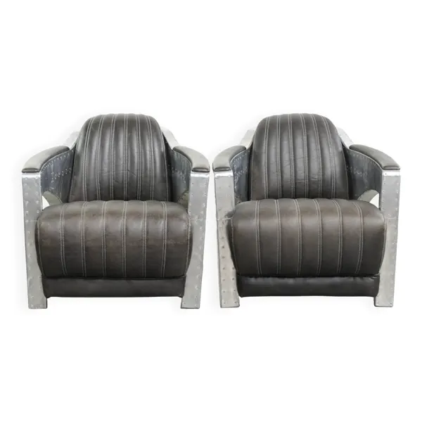 Ensemble de 2 fauteuils aviateur en cuir de vache noir robuste avec aluminium et rivets.