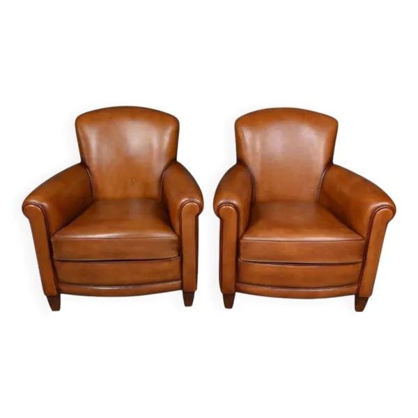 Paire de fauteuils club en cuir