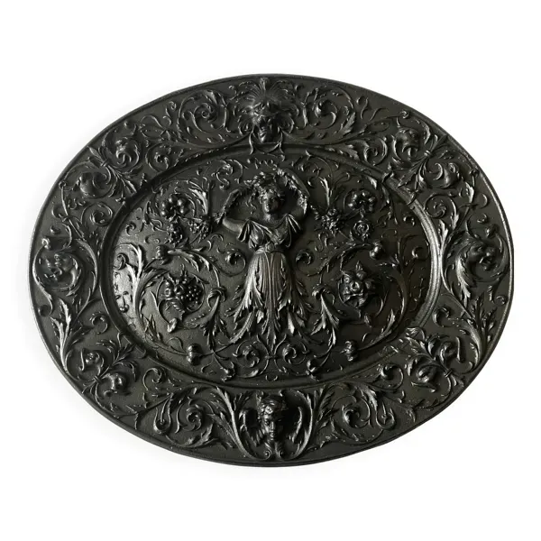 Plaque décorative en fonte début 20°siècle.