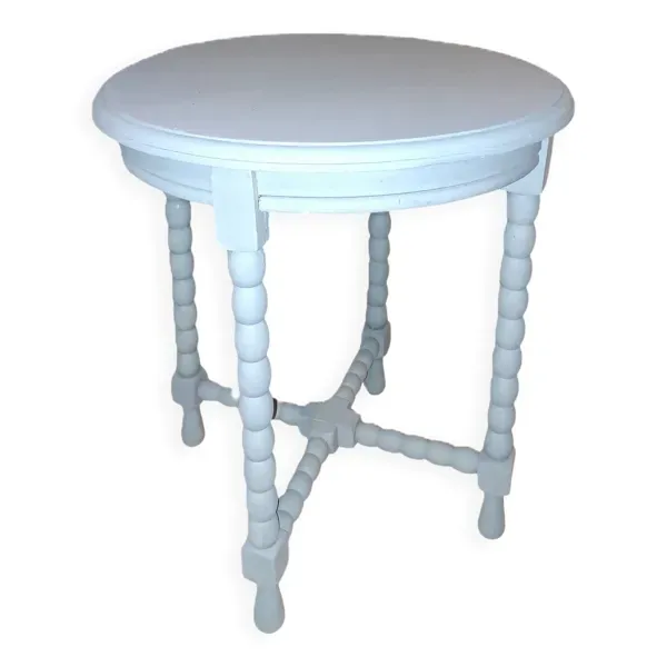 Table basse ronde en bois massif  à 4 pieds datant des années 1950 repeinte