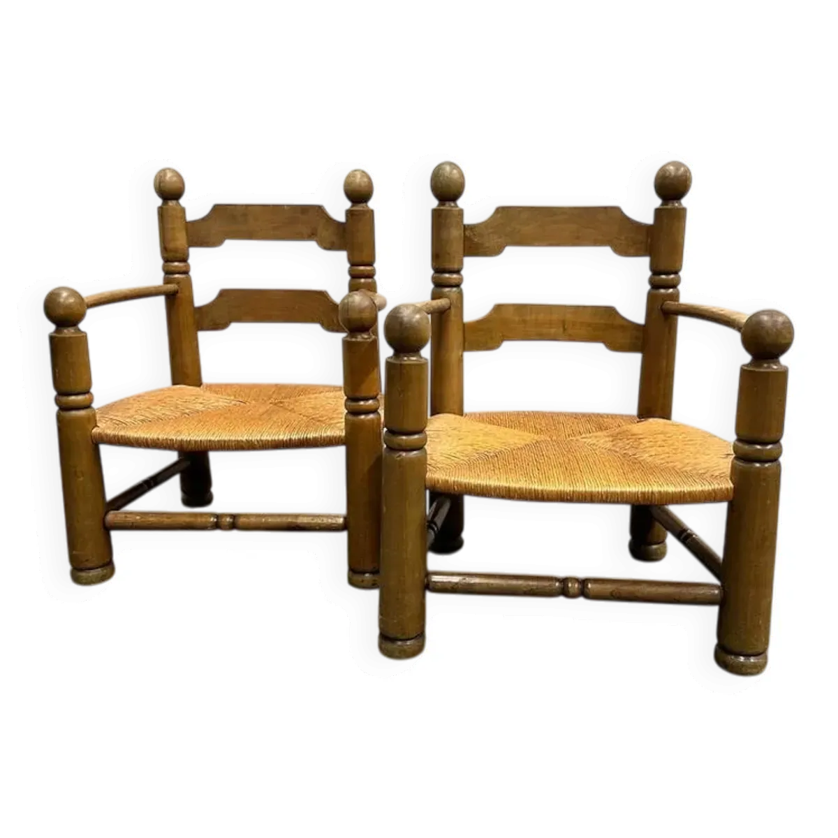 Paire de fauteuils bas en rotin Charles Dudouyt, années 1940.
