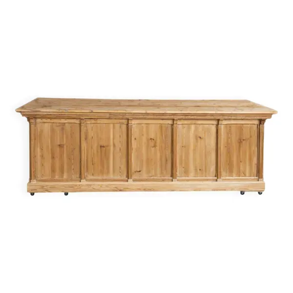 Grand comptoir de mercerie ancien en bois brut – 296 cm