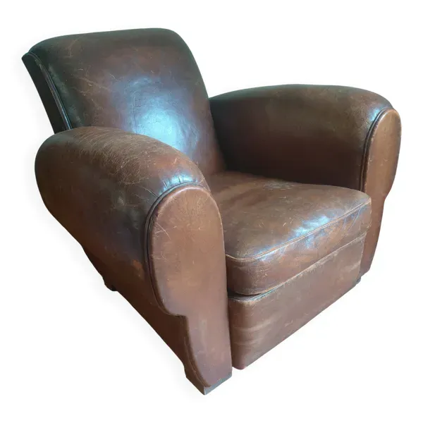 Fauteuil club,  cuir patiné