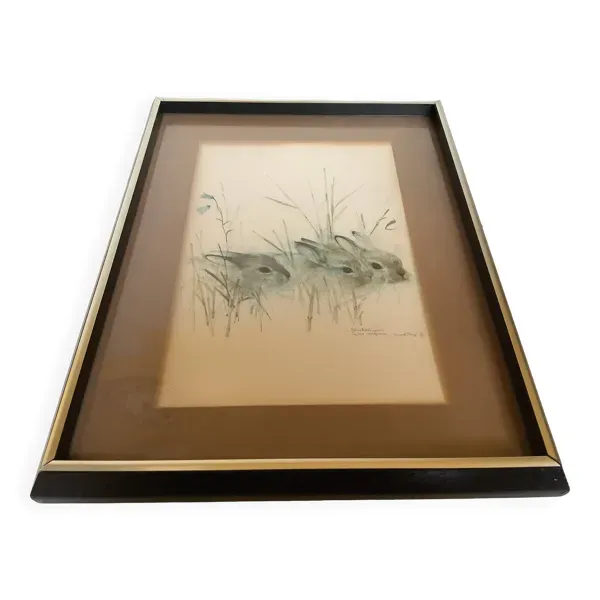 Grand cadre avec des lapins dans la nature