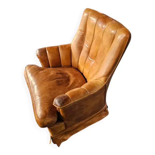 Fauteuil club en cuir de mouton des années 1970 avec porte-revues