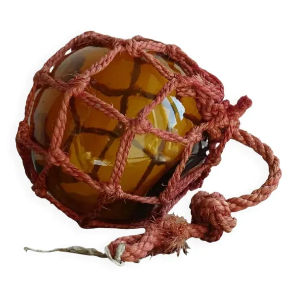 Flotteur de pêche vintage français en verre ambré