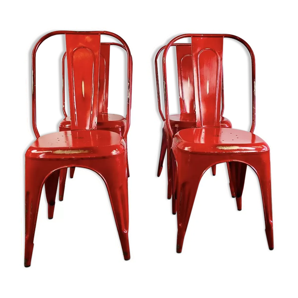 Ensemble de quatre chaises basses en acier rouge