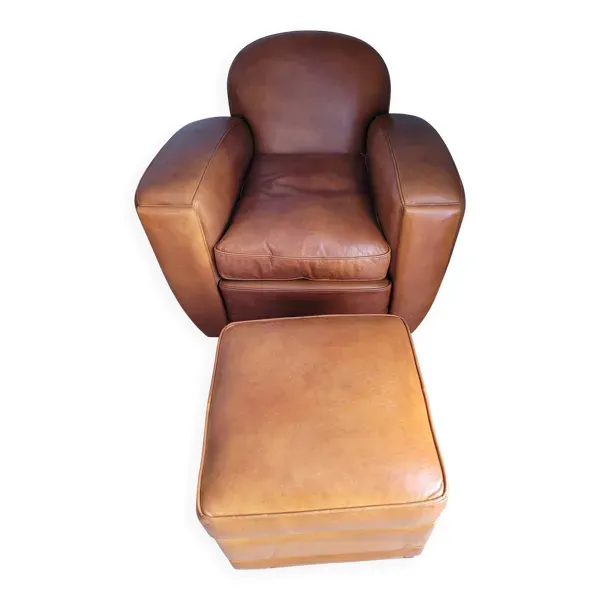Fauteuil club en cuir et son pouf