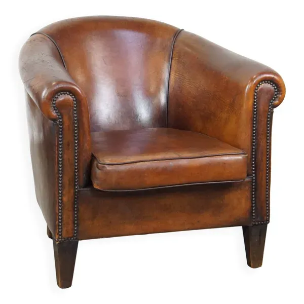 Fauteuil club en cuir de mouton vintage couleur cognac