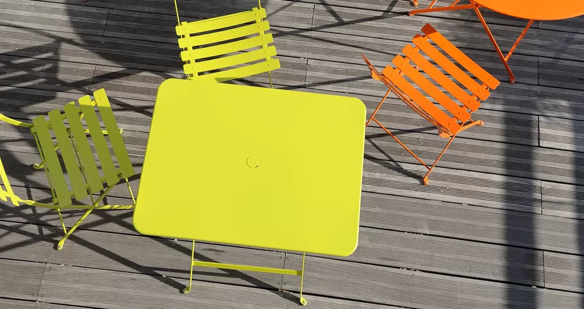 Illustration numéro 2 du produit Fermob Table BISTRO rectangulaire - C6 Miel - 77 x 57 cm