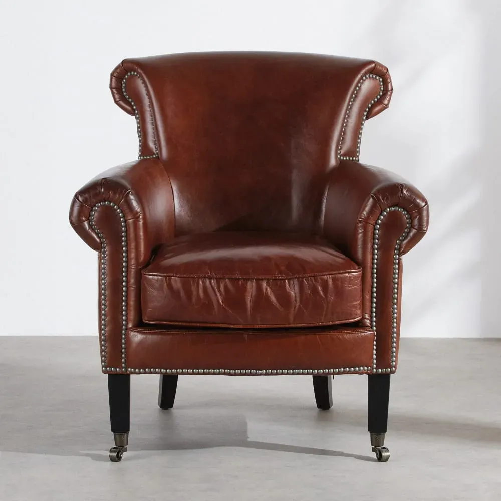Illustration numéro 2 du produit Fauteuil en cuir marron effet vieilli