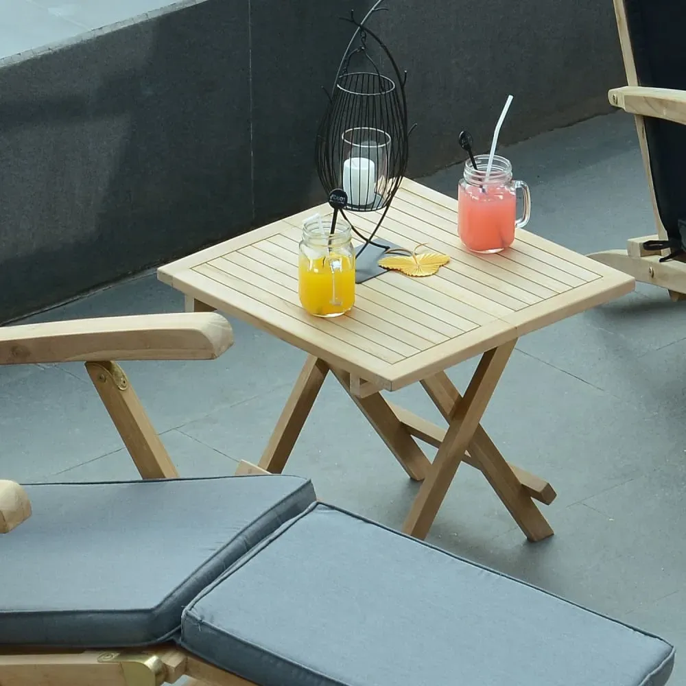 Illustration numéro 2 du produit Table basse pliante de jardin en teck massif L50 cm