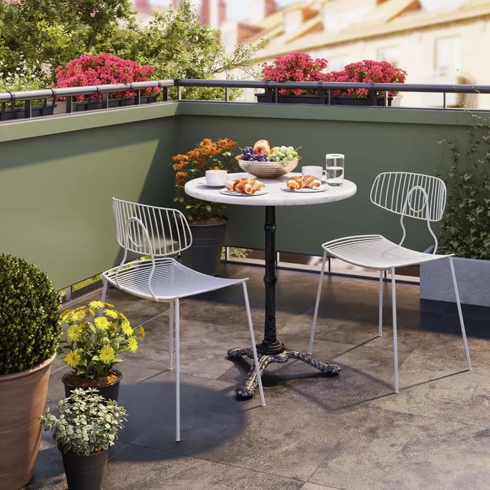 Illustration numéro 2 du produit Table à manger ronde 2 personnes en marbre blanc et acier D60