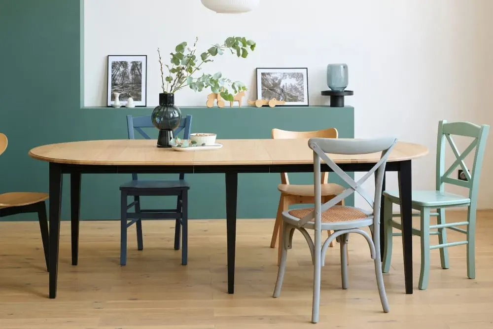 Illustration numéro 2 du produit Table ronde 6 pieds fuseau D105 + 3 rallonges bois noir