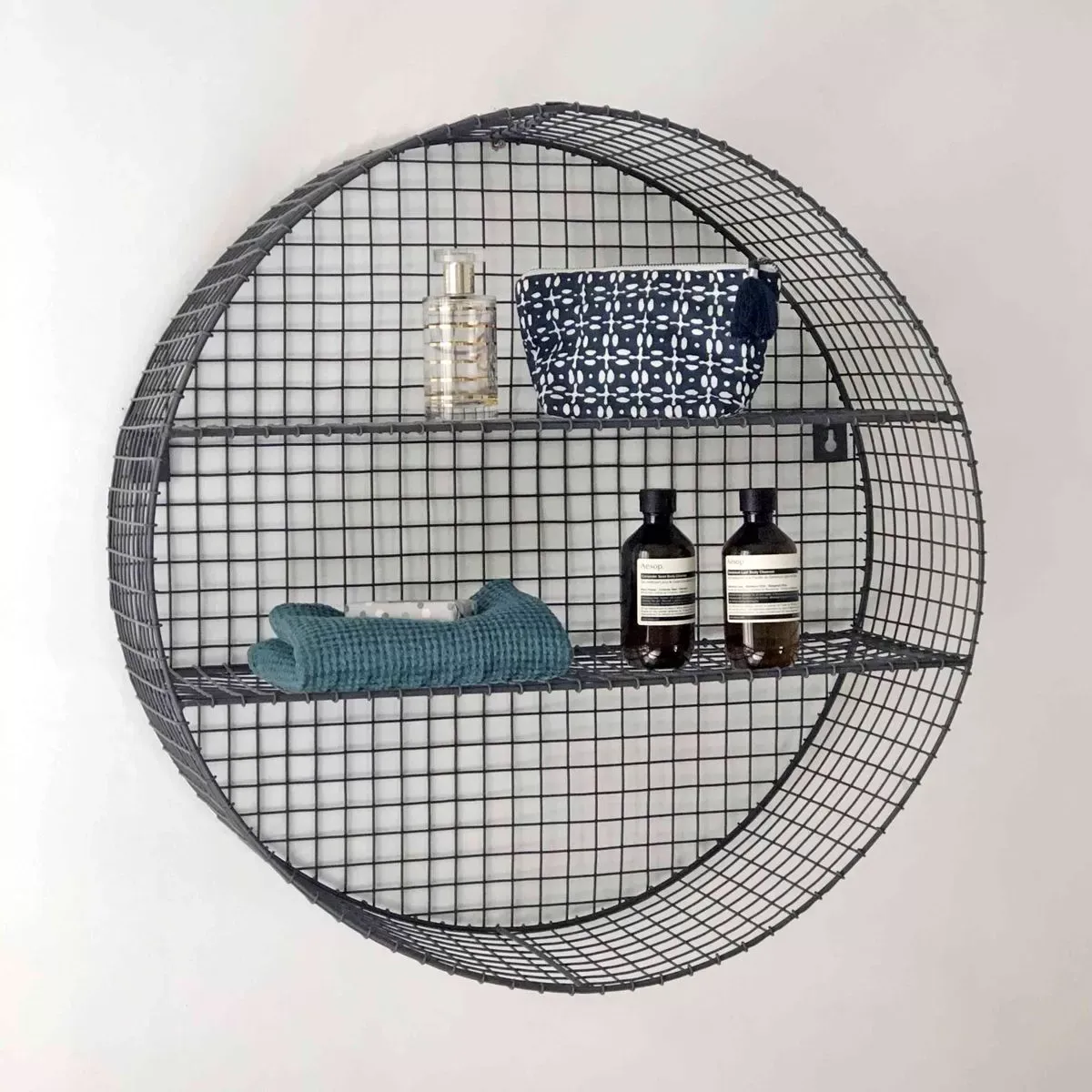 Illustration numéro 2 du produit Etagère murale ronde métal grillagé