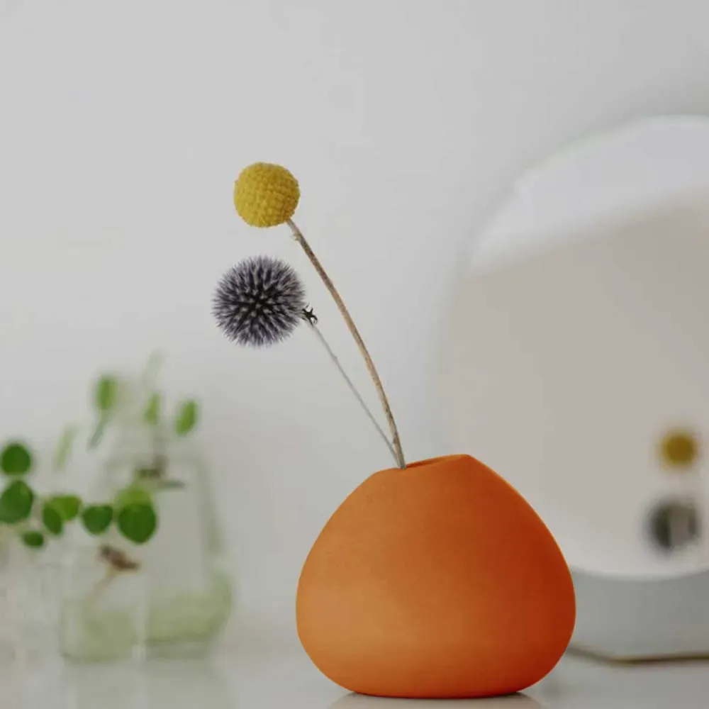 Illustration numéro 2 du produit Soliflore en béton naturel terracotta