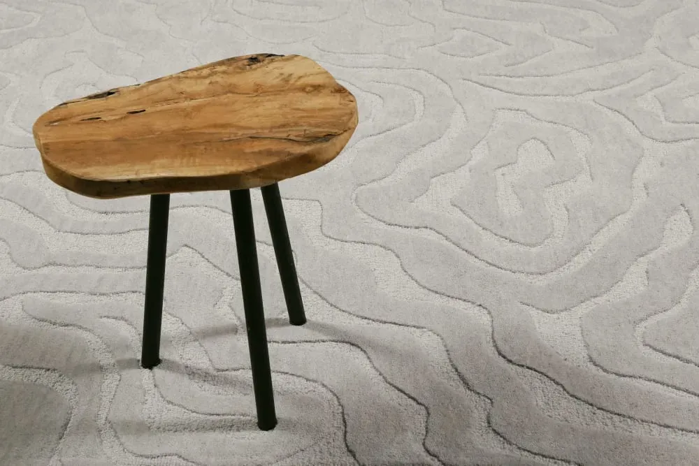 Illustration numéro 2 du produit Tapis fait main motif abstrait et relief taupe 160x230